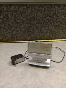 lot 1382 image: Westclox LCD Alarm Clock Radio with AC Adapter