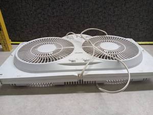 lot 1434 image: Pelonis Dual Fan Window Air Circulator with Temperature Control