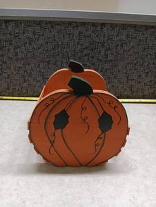 lot 1446 image: Orange Pumpkin Decorative Basket with Leaf Handle and Vine Details
