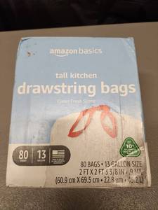lot 70998 image: Amazon Basics Tall Kitchen Drawstring Trash Bags 13 Gallon - Retail $15