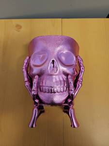 lot 71032 image: Purple Skull Head with Skeletal Hands Decorative Figurine Candy Bowl - Retail $6