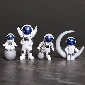 lot 2075 image: Ni-JASW Blue White Astronaut Figurines Statues Set of 4, Space Theme Decor