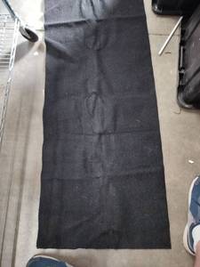 lot 2092 image: Black long foot mat approximately 93x24 in