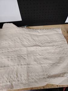 lot 2099 image: Off-white textured pillow sham, approximately 26x20 in