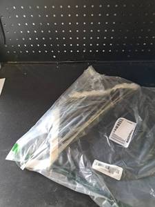 lot 18200 image: Black Fabric Garment in Sealed Plastic Packaging