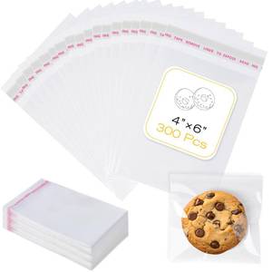 lot 20357 image: 300 Pcs Cookie Bags with Seal, 4x6 Inches Self Sealing Cellophane Bags, Clear Cookie Bag Resealable Treat Bags for Packaging Cookies, Candy, Gifts, Favors, 3 Mils Individual Self Adhesive Wrappers