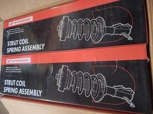 lot 1240 image: A-Premium Strut Coil Spring Assembly