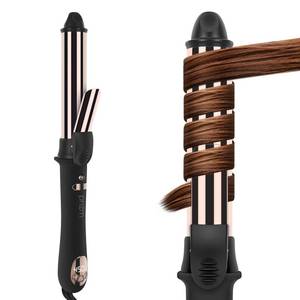 lot 11356 image: Prizm 1.25 Automatic Rotating Curling Iron 450°F