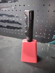 lot 14207 image: Threaded Stud Cowbell with Red Plastic Housing