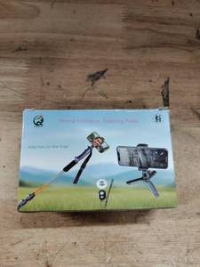 lot 18058 image: Phone Holder for Trekking Poles w Bluetooth Remote