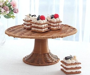 lot 7712 image: Woven Rattan display stand