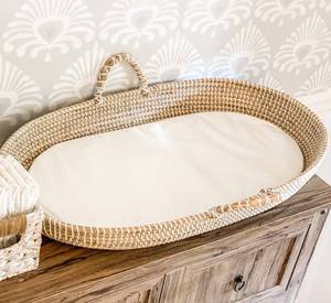 lot 7754 image: MiniMoose Seagrass Baby Changing Basket with Pad