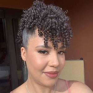 lot 8103 image: Oseti Curly Mohawk Wig Clip-In Hair Extension