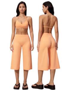 lot 20236 image: QBGJTD Womens Workout Sets Two Piece Halter Neck Open Back Sport Bra Matching Straight Wide Leg Capri Pants 2 Piece For Women Gym Yoga Active Wear Pilates Outfits Athletic Work Out Set Orange L