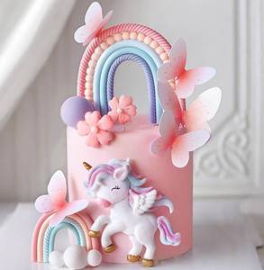 lot 12110 image: Rainbow Unicorn Cake Topper Set (used)