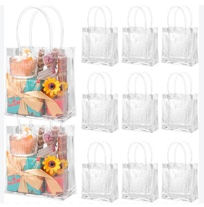 lot 14088 image: 19 Clear PVC Gift Bags with Gold Ribbon and Thank You Tag