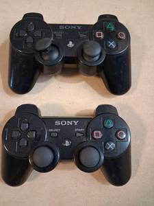lot 20 image: Sony PlayStation 3 Controller CECHZC2U Lot of 2