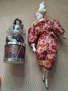 lot 28 image: 2 Porcelain Clown Dolls with Drum Base and Leopard Print Outfit