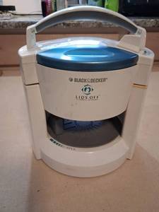 lot 61 image: Electric lid remover.