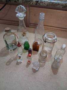 lot 84 image: Lot of 15 Glass Bottles and Jars with Stoppers and Closures