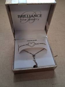 lot 119 image: Brilliance Fine Jewelry Sterling Silver Heart Bracelet and Necklace Set