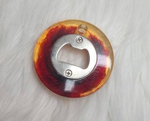 lot 3107 image: Handmade RedYellow Resin Bottle Opener- new
