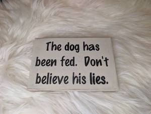 lot 3513 image: Funny Wooden Sign The dog has been fed Dont believe his lies - Design 1
