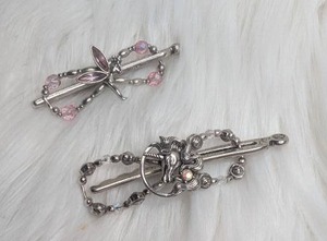 lot 4525 image: Two Decorative Hair Barrettes with Fairy and Unicorn Design