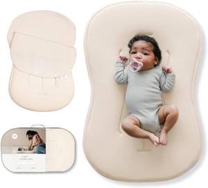 lot 3646 image: $99 Snuggle Me Organic Newborn Lounger Pillow & Travel Bag - Natural