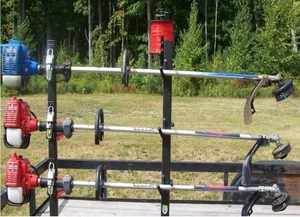lot 3693 image: $99 PK-6 3-Place Locking Trimmer Rack for Open Trailers