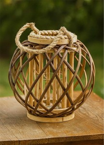 lot 3736 image: Barbara King 13 Round Wicker Lantern with Tiki Flame and Remote