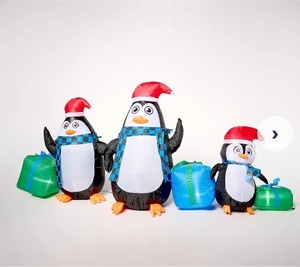 lot 3848 image: Kringle Express 8ft Inflatable Penguin Family with Presents
