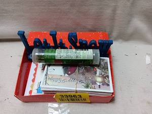 lot 33963 image: Christmas Cards, Tree scent enhancers, Let it Snow table decor