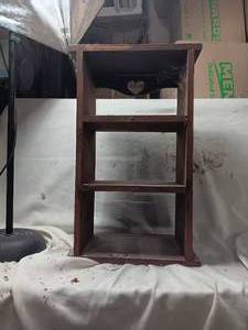 lot 33989 image: Dark wood tabletop shelving unitorganizer with 3 open tiers and a decorative cutout detail on the top