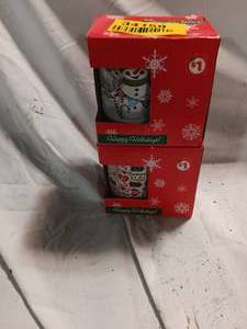 lot 34159 image: Lot of 2 New Happy Holidays Mugs.