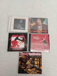 lot 21661 image: Lot of 5 CDs, Neil Diamond, Jimi Hendrix, Metallica, Iron Maiden