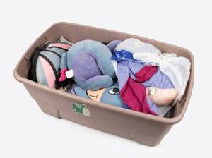lot 63622 image: Tote of Winnie the Pooh Eeyore Memorabilia and Plushies