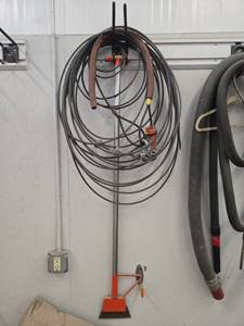 lot 19578 image: Steel Wire Rope Reel w Hoist Hook &amp Rigging and Floor Scrapper