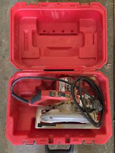 lot 1444 image: Milwaukee 7-14 in. Tilt-Lok Adjustable Handle Circular Saw  Model 6390