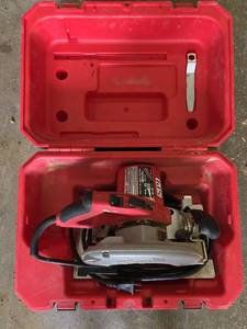 lot 1446 image: Milwaukee 7-14 in. Tilt-Lok Adjustable Handle Circular Saw  Model 6390