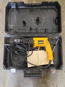 lot 1447 image: DeWalt 12 VSR Hammer Drill  Model DW505