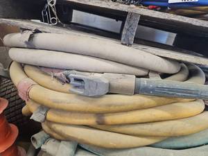 lot 15835 image: Coiled Hose with NH-2 Threaded Coupling and Nozzle