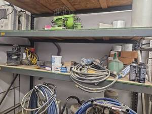 lot 15854 image: Contents of shelf Including Automatic Utility Pump and More