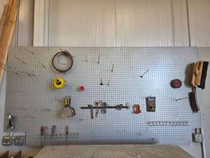 lot 15905 image: Assorted Lot of Hand Tools and Hardware - Pegboard and Wooden Worktable Included