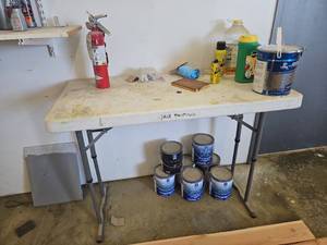 lot 21821 image: Contents of Shelfs Including Folding Table, Interior paint and Paint Accessories