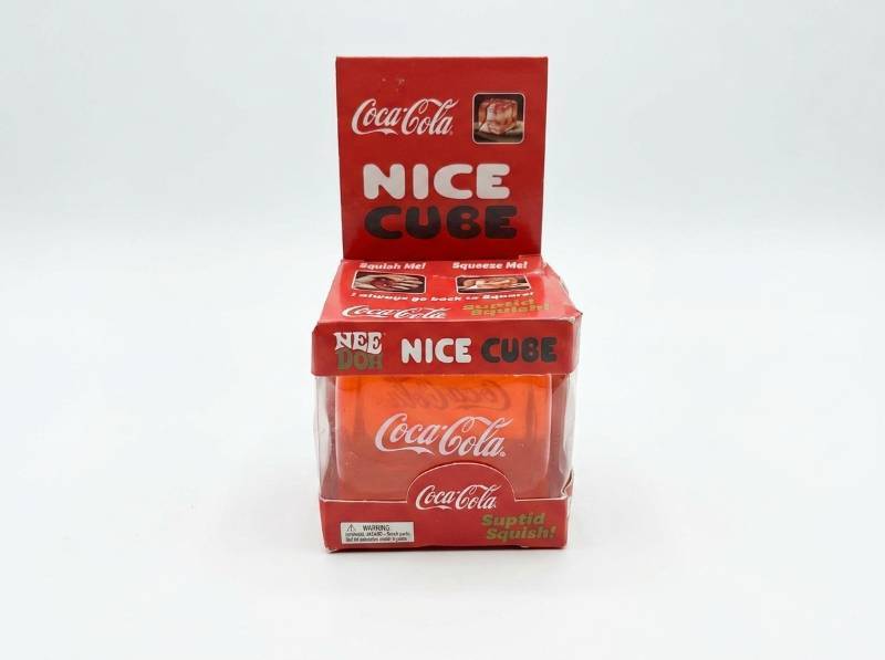lot 63942 image: Coca-Cola Nee Doh Nice Cube Squishable Toy