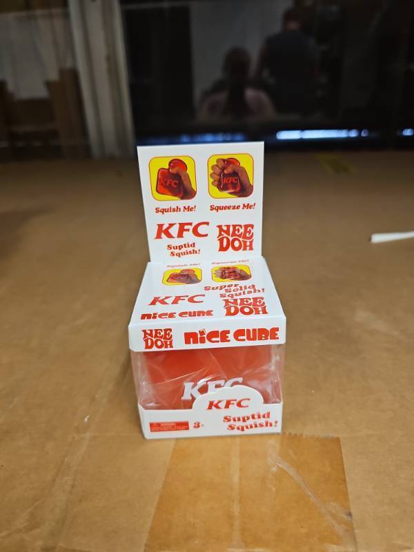 lot 63956 image: NeeDoh Nice Cube Sensory Toy - Red KFC