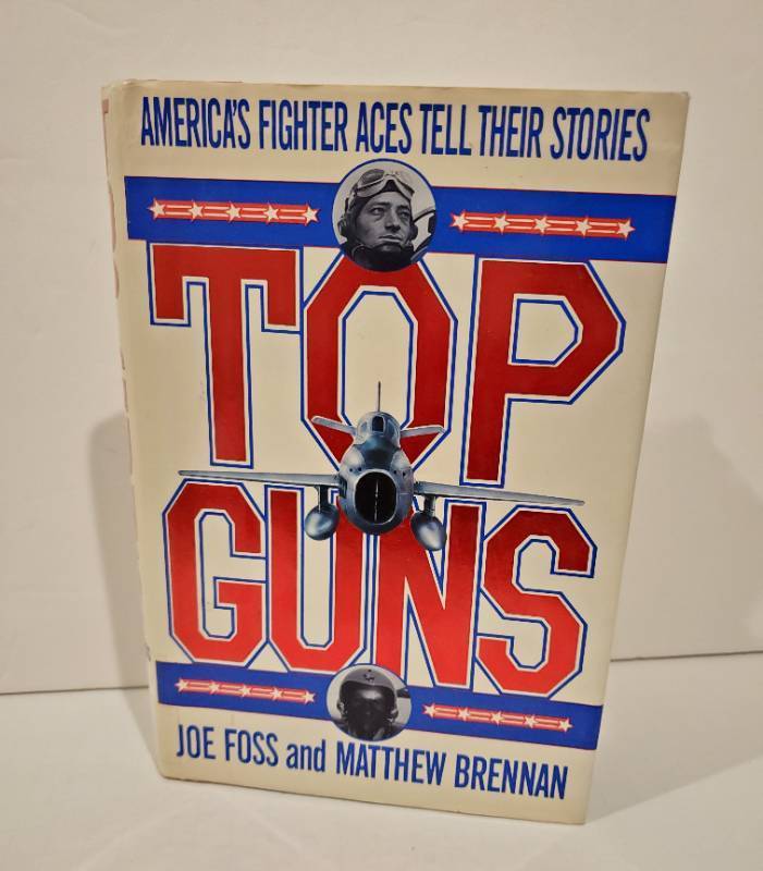 lot 59085 image: Top Guns Americas Fighter Aces Tell Their Stories by Joe Foss and Matthew Brennan - Retail $22