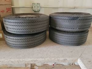 lot 23736 image: (4) Carlisle USA Trail 5.70-8 Tires with Wheels&nbsp