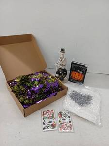 lot 10326 image: Holiday Decoration Bundle, Skeleton, Pumpkin Book, Spider Web, And Pop Up Tree